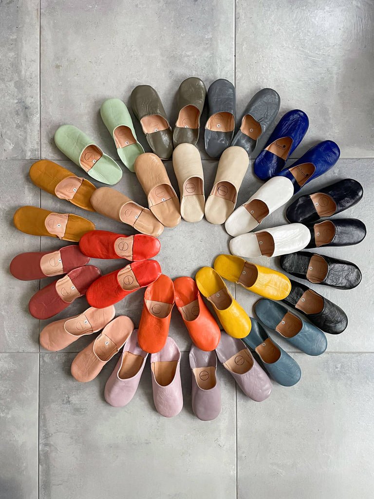 A vibrant array of handmade Moroccan leather babouche slippers in classic design, small slight seconds | Bohemia Design