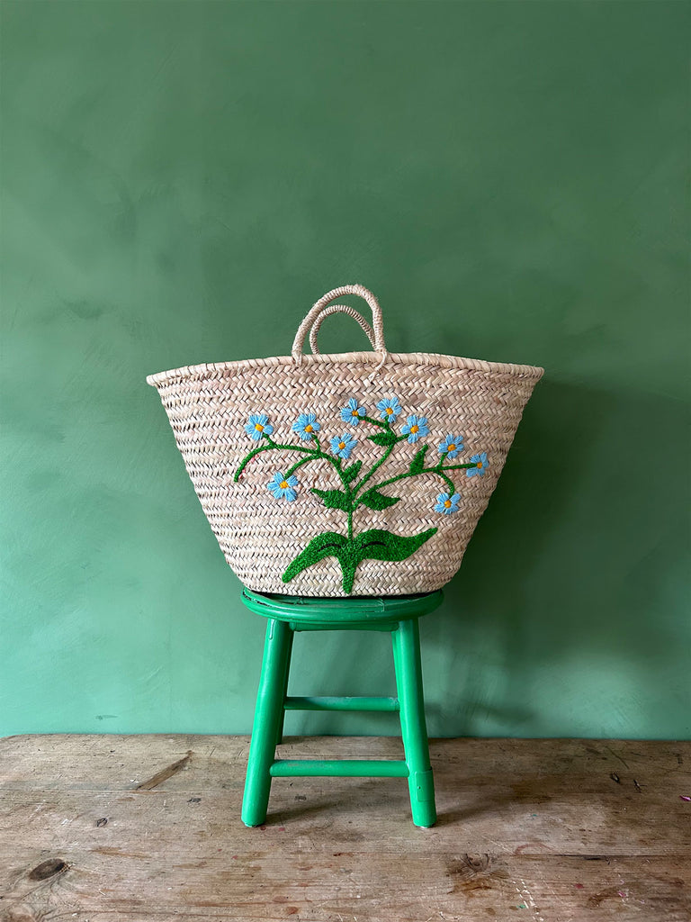 Boho natural handwoven market basket, featuring delicate sky blue embroidered Forget-Me-Not florets by Bohemia Design