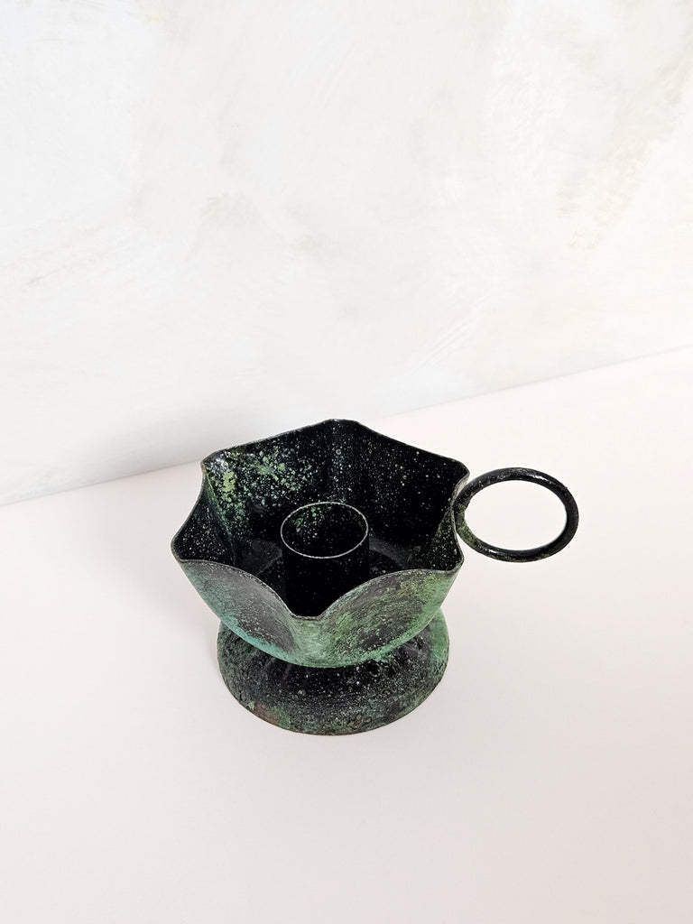 Top view of Frill iron candle holder with a vintage finger hold in a rustic green-moss finish | Bohemia