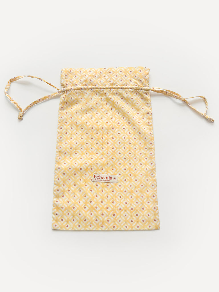 Cotton voile drawstring bag in Buttermilk yellow with Bohemia label on the front