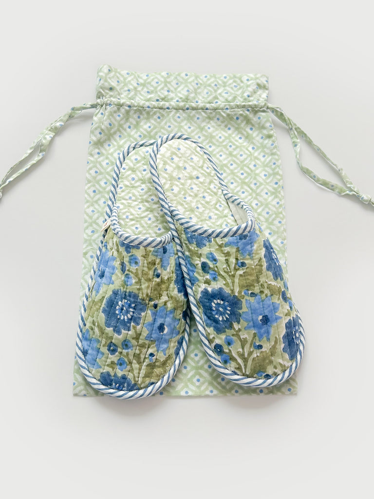 A pair of floral house slippers with a lining in a contrasting Ditsy print and a matching cotton voile drawstring bag - ideal for travel | Bohemia Design