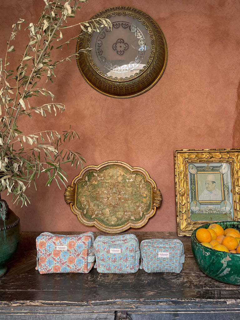 Set of three hand block printed cotton washbags in duck egg set against a terracotta Moroccan backdrop by BohemiaDesign