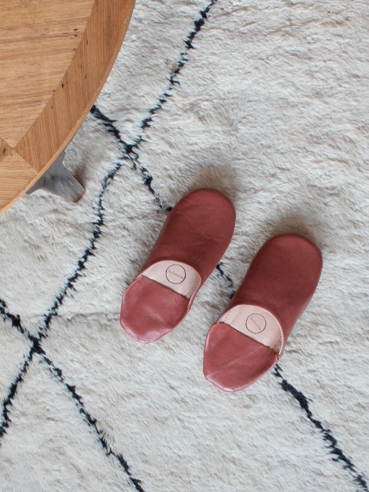 Moroccan Babouche Basic Slippers in Terracotta on a cosy cream rug