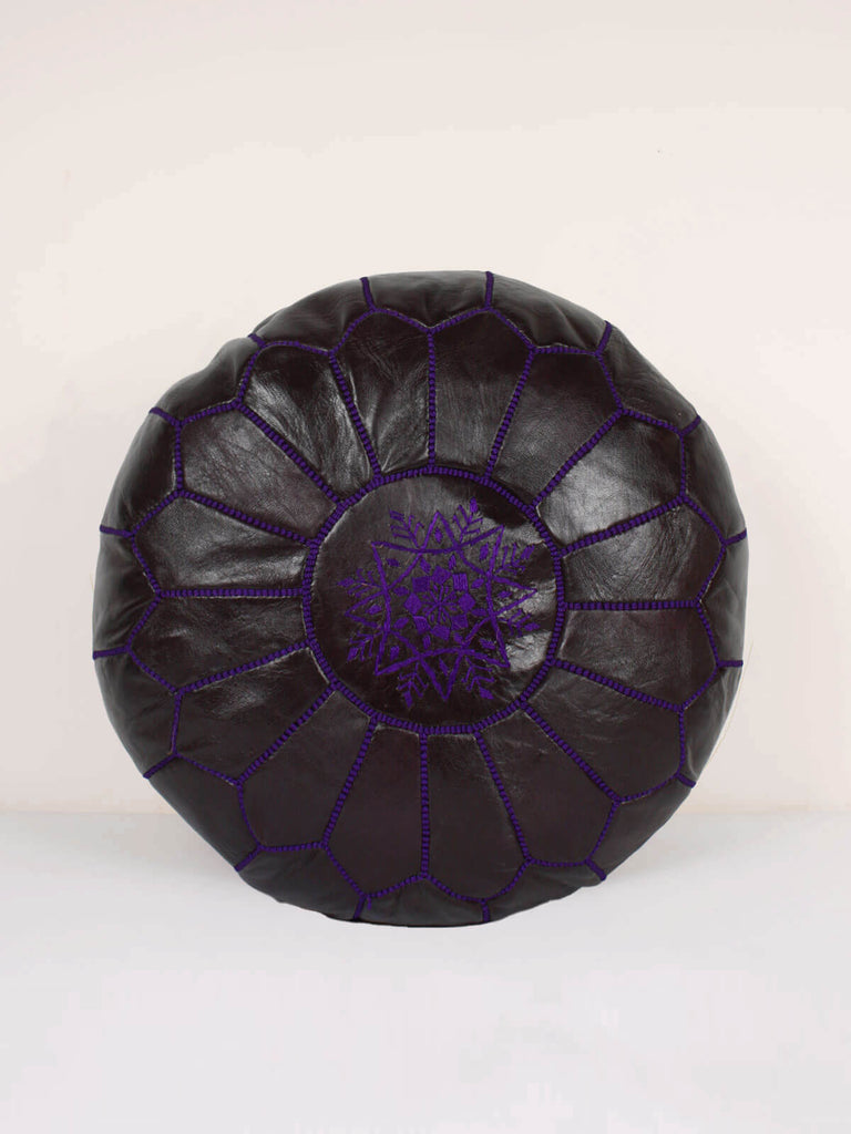 Moroccan pouffe in blackberry leather with purple embroidered panel