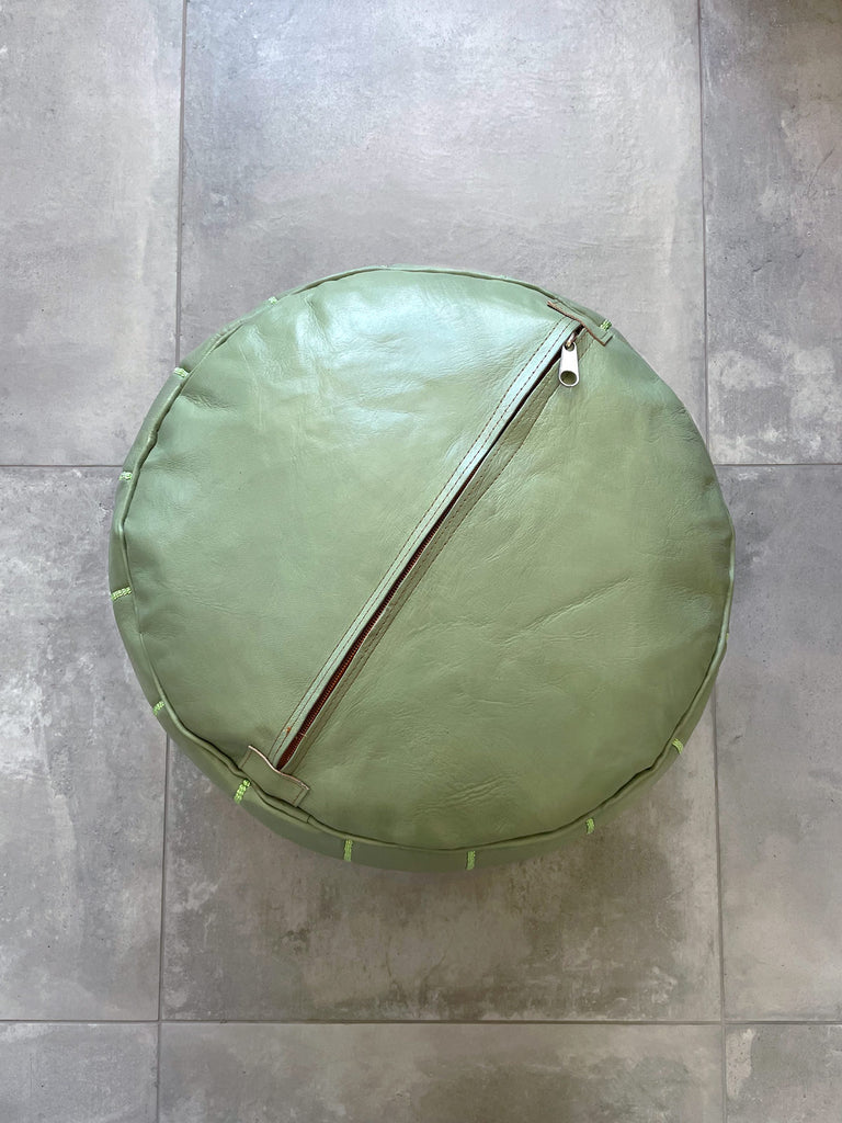 Moroccan leather pouffe in sage, showing the back zipper | Bohemia Design