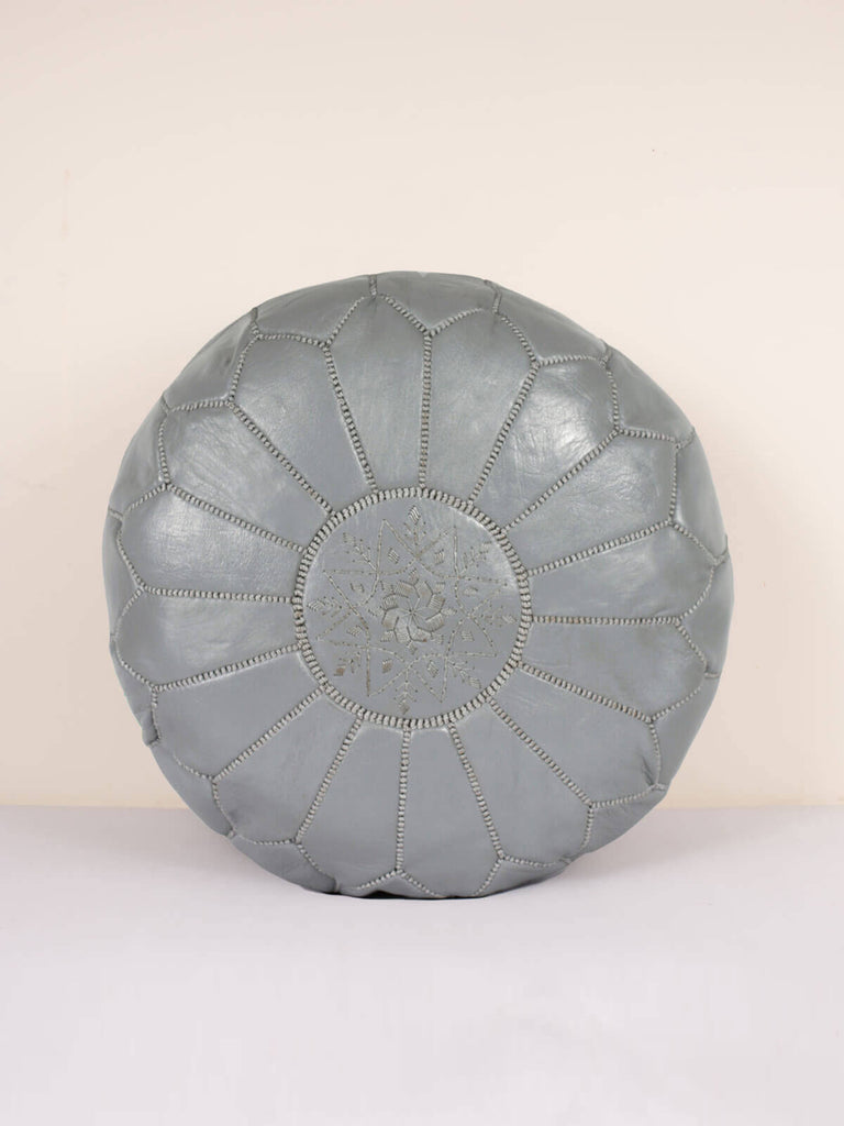 Moroccan leather pouffe with traditional hand embroidered design in slate grey