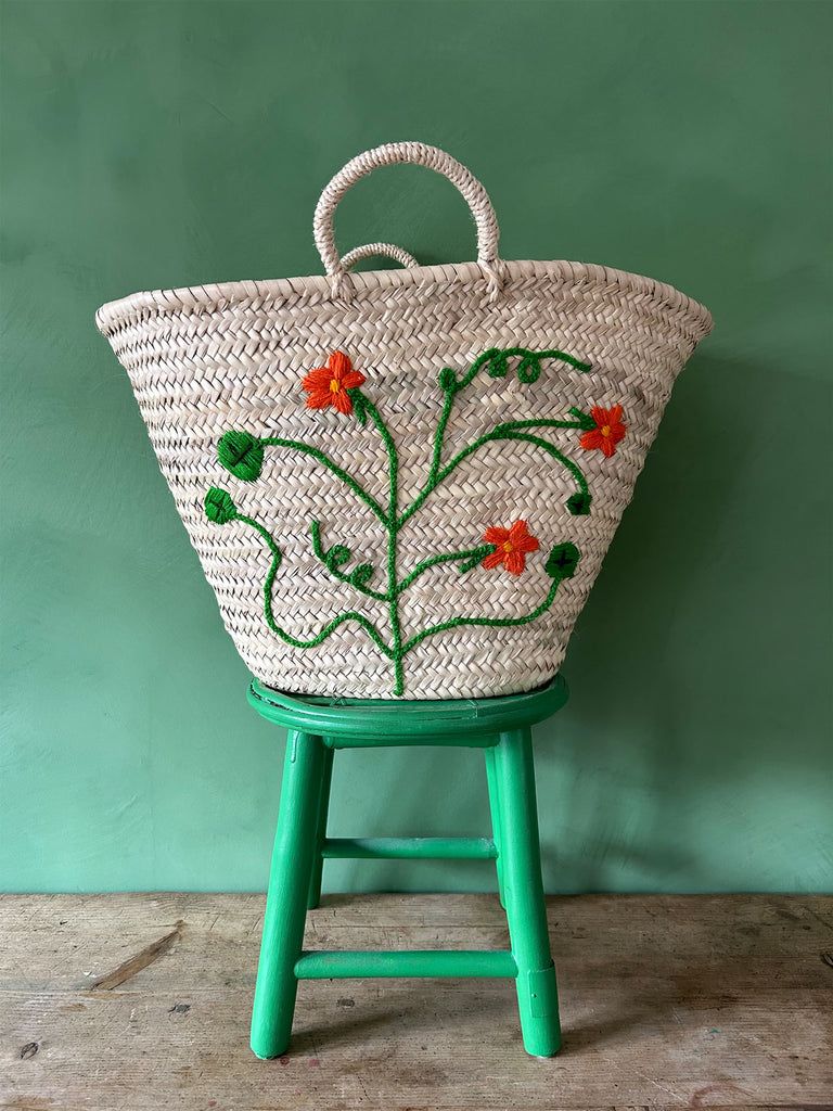 Nature-inspired hand-embroidered market basket featuring a vibrant Nasturtium floral motif by Bohemia Design