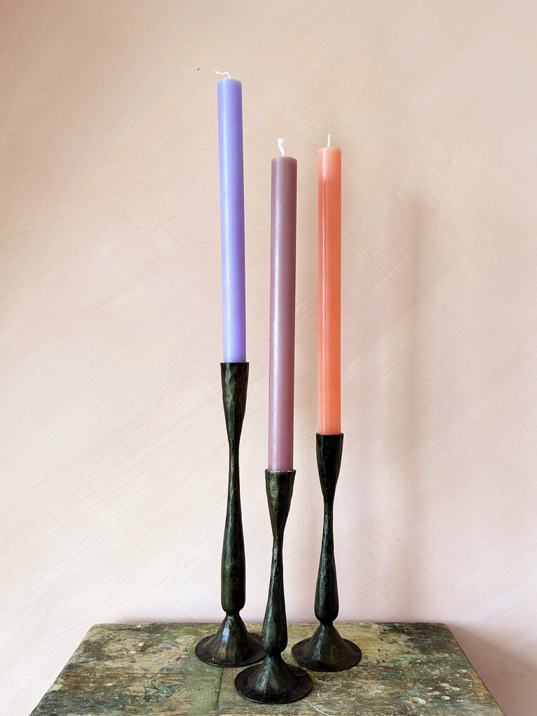 3 different sizes of Shelley antique candle holders with colourful candles