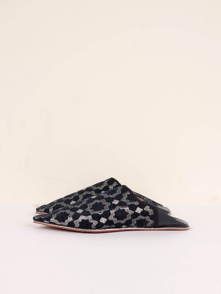 Side view of a pair of black Moroccan Star Brocade Pointed Babouche Slippers | Bohemia Design