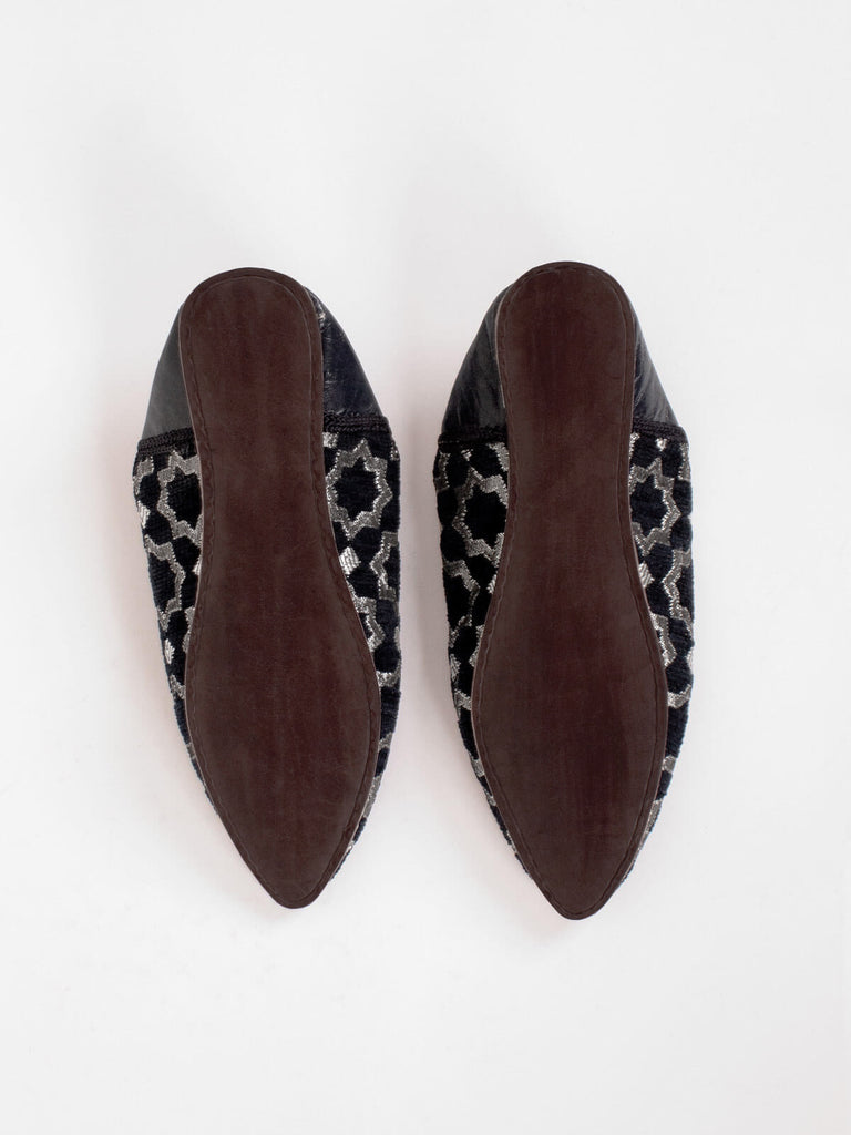 Hard leather sole of a pair of Moroccan Star Brocade Pointed Babouche Slippers in black | Bohemia Design