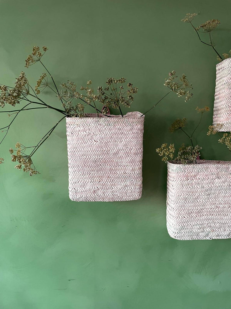 A group of three Moroccan hanging wall baskets