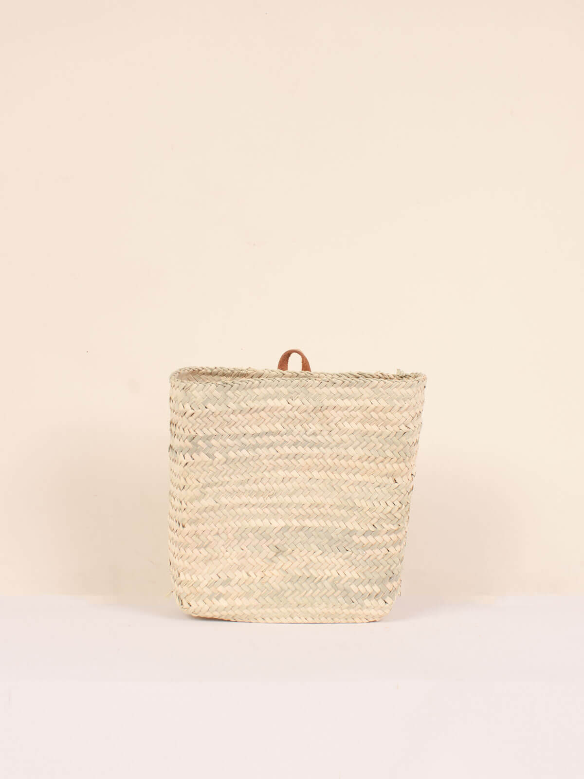 Small rectangular wall basket with small leather loop for hanging