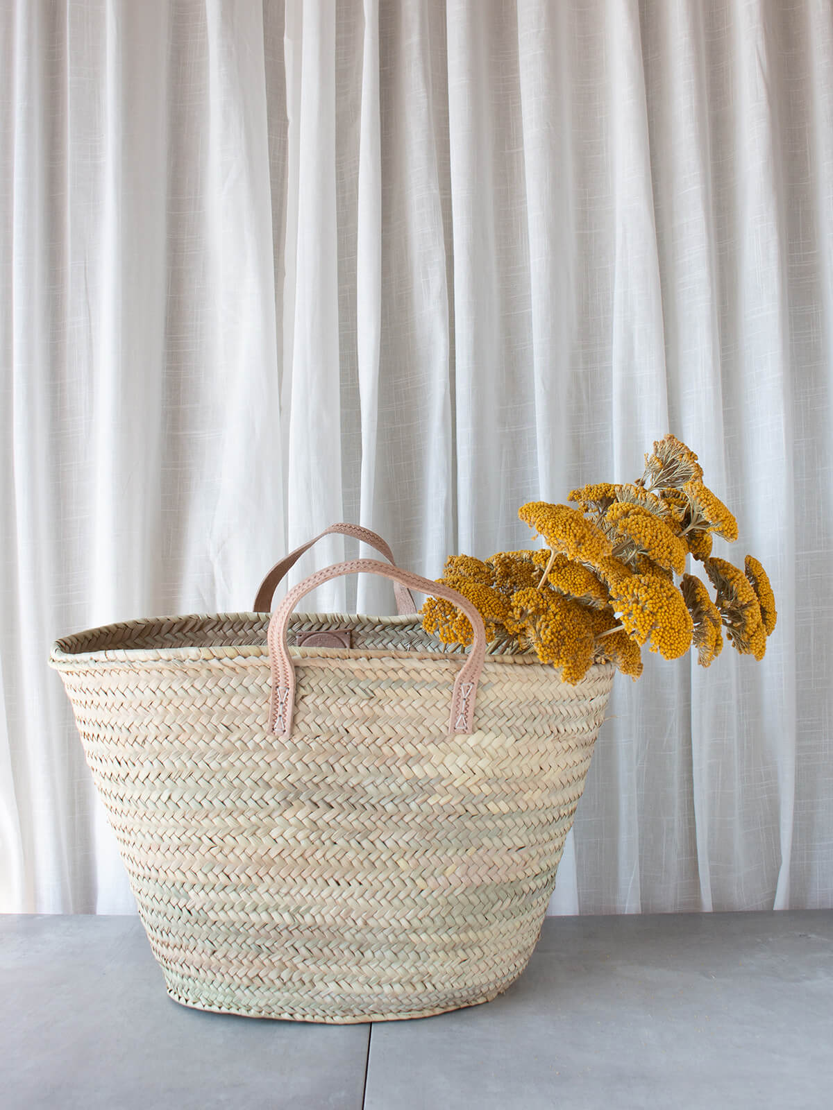 Parisienne market basket with dried yellow flowers by Bohemia design