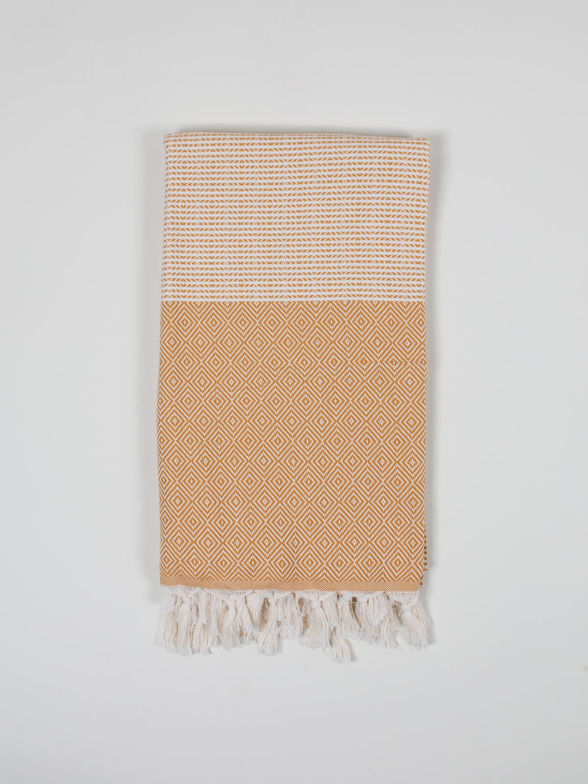 Nordic Dot Hammam Towel in mustard diamond pattern by Bohemia Design